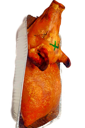Lechona tolimense recién preparada en Lechonería Mi Gordita